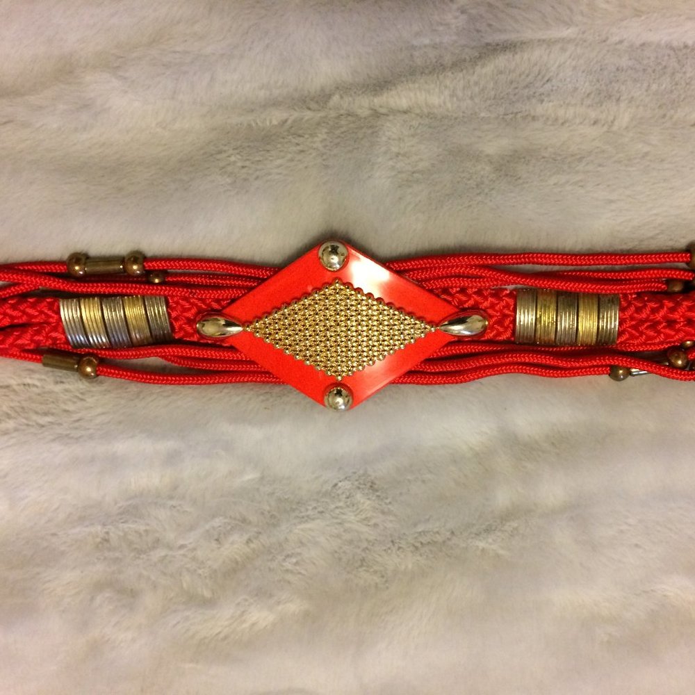 Women's Red 26" belt, with intricate knotting, and hook closure
